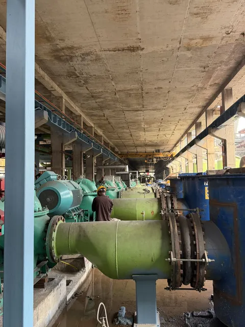Green pumps and process piping installed in a plant hall