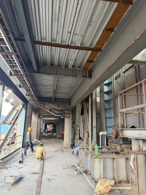 Covered plant gallery with structural steel and equipment