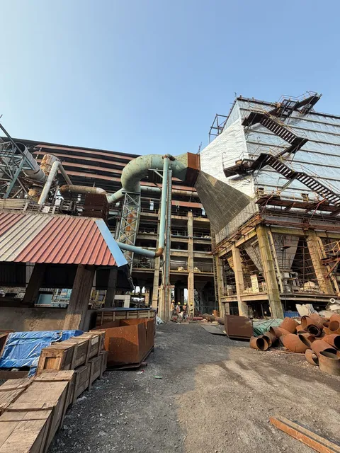 Steel structure and ducting under erection in a plant yard